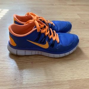 orange and blue nike running shoes!